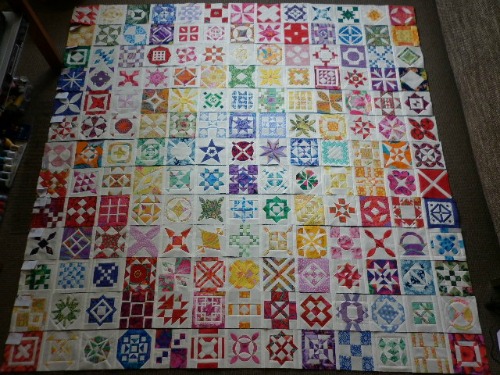 DJ quilt top with blocks stitched in rows
