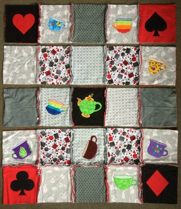 Applique rag quilt laid out